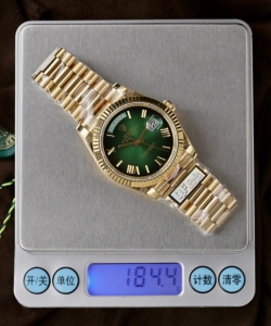 Rolex day-date 228238-0069 green ombre 185 grams 40mm