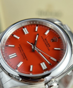 Rolex oyster perpetual 126000 red dial 36mm