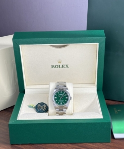 Rolex oyster perpetual 126000 green dial 36mm