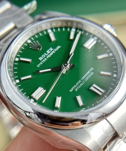 Rolex oyster perpetual 126000 green dial 36mm