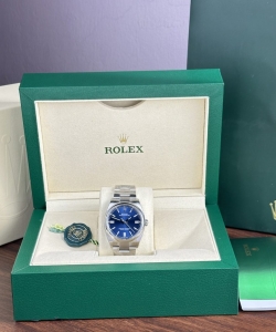 Rolex oyster perpetual 126000 blue dial clean fatory 36mm