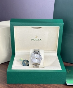 Rolex watch oyster perpetual 126000 silver dial 36mm