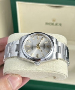 Rolex watch oyster perpetual 126000 silver dial 36mm