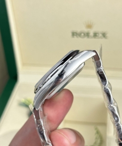 Rolex watch oyster perpetual 126000 silver dial 36mm