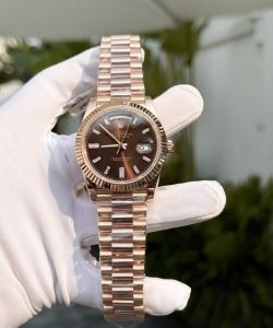 Rolex day-date 228235 gold wrapped chocolate dial 40mm