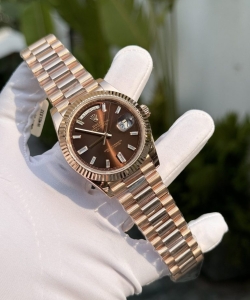 Rolex day-date 228235 gold wrapped chocolate dial 40mm