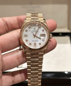 Rolex day-date mother of pearl rose gold 36mm