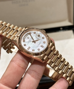 Rolex day-date mother of pearl rose gold 36mm