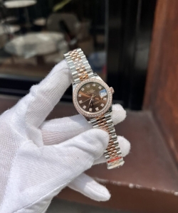 Rolex datejust women’s chocolate dial diamond bezel 31mm