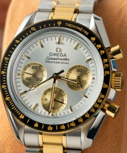 omega speedmaster moonwatch chronogarph demi gold 42mm