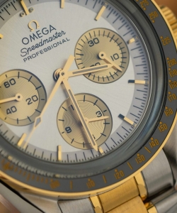 omega speedmaster moonwatch chronogarph demi gold 42mm