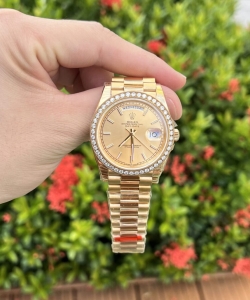 Rolex day-date diamond bezel champagne dial 40mm