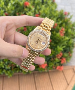 Rolex day-date diamond bezel champagne dial 40mm