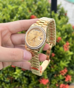 Rolex day-date diamond bezel champagne dial 40mm