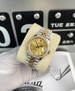 Rolex datejust women’s with stone bezel champagne dial 31mm