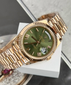 Rolex day-date 228235 green dial 40mm