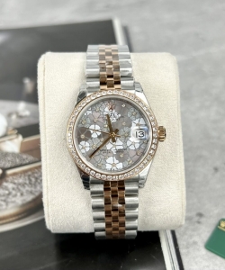 Rolex datejust flower dial with diamond bezel 31mm