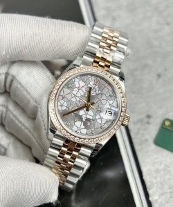 Rolex datejust flower dial with diamond bezel 31mm