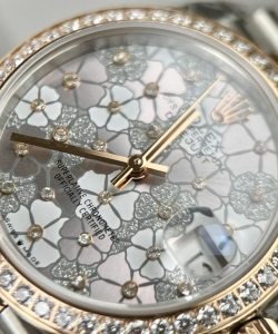 Rolex datejust flower dial with diamond bezel 31mm