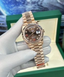 Rolex day-date with red ruby dial 40mm