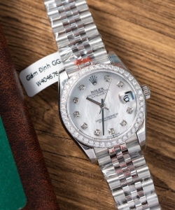 Rolex datejust mother of pearl dial with moissanite bezel 31mm