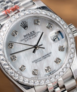 Rolex datejust mother of pearl dial with moissanite bezel 31mm