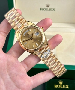 Rolex day-date 228238 yellow dial president strap 40mm