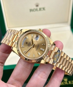 Rolex day-date 228238 yellow dial president strap 40mm