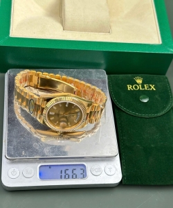 Rolex day-date 228238 yellow dial president strap 40mm