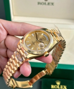 Rolex day-date 228238 yellow dial president strap 40mm