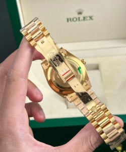 Rolex day-date 228238 yellow dial president strap 40mm